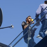 
              Mercedes driver Lewis Hamilton of Britain gestures during a television interview on the roof terrace of his motorhome at the Monaco racetrack, in Monaco, Wednesday, May 20, 2015. The Formula One Grand Prix of Monaco will be held on Sunday. (AP Photo/Luca Bruno)
            