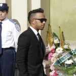 
              British Mercedes driver Lewis Hamilton arrives at the Sainte Reparate Cathedral to attend the funeral of French Formula One driver Jules Bianchi in Nice, French Riviera, Tuesday, July 21, 2015. Bianchi, 25, died Friday from head injuries sustained in a crash at last year's Japanese Grand Prix. He had been in a coma since the Oct. 5 accident, in which he collided at high speed with a mobile crane which was being used to pick up another crashed car. (AP Photo/Lionel Cironneau)
            