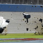 
              Ryan Briscoe flips through the infield grass Saturday June 27, 2015, during the IndyCar auto race at Auto Club Speedway in Fontana, Calif. (AP Photo/Will Lester)
            
