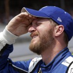 
              Sprint Cup Series driver Dale Earnhardt Jr. (88) squints as he checks speeds on the scoreboard during qualifying for the NASCAR Brickyard 400 auto race at Indianapolis Motor Speedway in Indianapolis, Saturday, July 25, 2015. (AP Photo/AJ Mast)
            