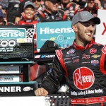 
              Austin Dillon celebrates in Victory Lane after winning the NASCAR Xfinity series auto race at Charlotte Motor Speedway in Concord, N.C., Saturday, May 23, 2015. (AP Photo/Terry Renna)
            