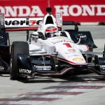 
              Will Power, of Australia, makes a corner during practice for the IndyCar auto race Saturday, June 13, 2015, in Toronto. (Nathan Denette/The Canadian Press via AP) MANDATORY CREDIT
            