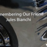 
              A sign commemorating late French Formula One driver Jules Bianchi is placed on a Force India car during the free practice at the Hungarian Formula One Grand Prix in Budapest, Hungary, Saturday, July 25, 2015. Bianchi, 25, died Friday July, 17, from head injuries sustained in a crash at last year's Japanese Grand Prix. The Hungarian Formula One Grand Prix will be held on Sunday July, 26. (AP Photo/Ronald Zak)
            