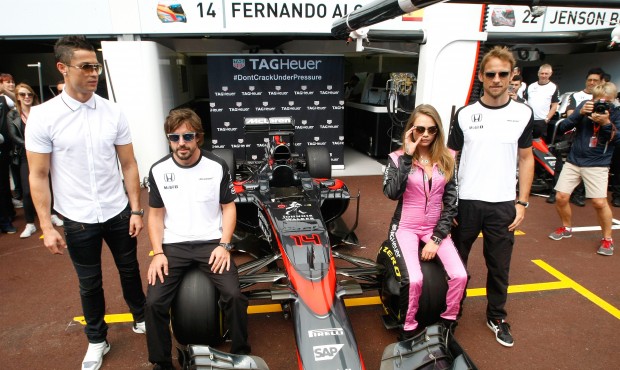 From left, soccer star player Cristiano Ronaldo, McLaren driver Fernando Alonso, of Spain, model Ca...
