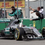 
              Mercedes driver Lewis Hamilton, of Great Britain, is saluted by his crew as he wins the Canadian Grand Prix auto race on Sunday, June 7, 2015, in Montreal. (Tom Boland/The Canadian Press via AP) MANDATORY CREDIT
            