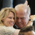 
              Jerry Cook, right, hugs his daughter Kristi Jones after being named to the 2016 class of the NASCAR Hall of Fame, during an announcement at the hall in Charlotte, N.C., Wednesday, May 20, 2015. (AP Photo/Chuck Burton)
            