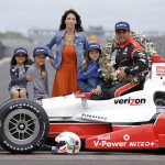 
              Juan Pablo Montoya, of Colombia, poses with his family, left to right, daughter Manuela, son Sebastian, wife Connie and daughter Paulina during the traditional winners photo session at Indianapolis Motor Speedway in Indianapolis, Monday, May 25, 2015. Montoya won the 99th running of the Indianapolis 500 auto race on Sunday.  (AP Photo/Michael Conroy)
            