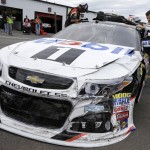 
              FILE - In this Friday, June 5, 2015, file photo, driver Tony Stewart climbs from his damaged race car in the garage area after hitting the wall at Pocono Raceway during practice for the NASCAR Sprint Cup Series auto race in Long Pond, Pa. Stewart is still winless during a trying 2015 season. (AP Photo/Mel Evans, File)
            