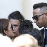 
              British Mercedes driver Lewis Hamilton, right, offers condolences to Christine Bianchi , mother of Jules Bianchi, at the Sainte Reparate Cathedral after the funeral of French Formula One driver Jules Bianchi in Nice, French Riviera, Tuesday, July 21, 2015. Bianchi, 25, died Friday from head injuries sustained in a crash at last year's Japanese Grand Prix. He had been in a coma since the Oct. 5 accident, in which he collided at high speed with a mobile crane which was being used to pick up another crashed car. (AP Photo/Lionel Cironneau)
            