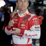 
              Kevin Harvick looks out of the garage before practice for Sunday's NASCAR Coca-Cola 600 Sprint Cup series auto race at Charlotte Motor Speedway in Concord, N.C., Thursday, May 21, 2015. (AP Photo/Chuck Burton)
            