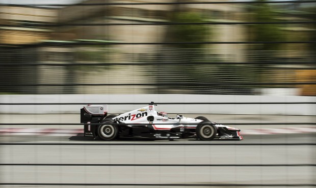 Will Power, of Australia, accelerates around a corner during practice for the IndyCar auto race Sat...