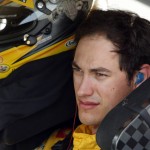 
              Joey Logano sits in his car as he waits for qualifying to begin for Sunday's NASCAR Sprint Cup series auto race at New Hampshire Motor Speedway, Friday, July 17, 2015, in Loudon,NH (AP Photo/Jim Cole)
            