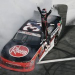 
              Austin Dillon (33) celebrates on the front stretch after winning the NASCAR Xfinity series auto race at Charlotte Motor Speedway in Concord, N.C., Saturday, May 23, 2015. (AP Photo/Gerry Broome)
            