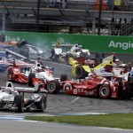 
              Will Power, of Australia, takes the lead as Scott Dixon, of New Zealand, spins on the start of the Grand Prix of Indianapolis auto race at Indianapolis Motor Speedway in Indianapolis, Saturday, May 9, 2015. (AP Photo/Michael Conroy)
            