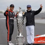 
              Juan Pablo Montoya, of Colombia, and his father,  Pablo,  poses with the Borg-Warner Trophy during the traditional winners photo session at Indianapolis Motor Speedway in Indianapolis, Monday, May 25, 2015. Montoya won the 99th running of the Indianapolis 500 auto race on Sunday.  (AP Photo/Michael Conroy)
            