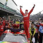 
              Kyle Busch celebrates after winning the NASCAR Brickyard 400 auto race at Indianapolis Motor Speedway in Indianapolis, Sunday, July 26, 2015. (AP Photo/Michael Conroy)
            