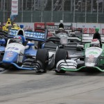 
              Carlos Munoz of Colombia, right, passes Tristan Vautier of France during the first race of the IndyCar Detroit Grand Prix auto racing doubleheader Saturday, May 30, 2015, in Detroit. (AP Photo/Dave Frechette)
            