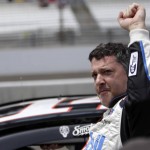 
              Sprint Cup Series driver Tony Stewart (14) gesture to the fans after he qualified for the NASCAR Brickyard 400 auto race at Indianapolis Motor Speedway in Indianapolis, Saturday, July 25, 2015. (AP Photo/AJ Mast)
            