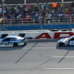 
              Dale Earnhardt Jr. (88) leads Jimmie Johnson (48) through the tri-oval on the final lap of the Talladega 500 NASCAR Sprint Cup Series auto race at Talladega Superspeedway, Sunday, May 3, 2015, in Talladega, Ala. (AP Photo/David Tulis)
            