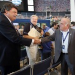 
              Jerry Cook, left, is congratulated by NASCAR vice-chairman Mike Helton, left, after being named to the 2016 class of the NASCAR Hall of Fame during an announcement at the NASCAR Hall of Fame in Charlotte, N.C., Wednesday, May 20, 2015. (AP Photo/Terry Renna)
            