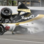 
              The car driven by Josef Newgarden slides down the track after hitting the wall in the first turn and going airborne during practice for the Indianapolis 500 auto race at Indianapolis Motor Speedway in Indianapolis, Thursday, May 14, 2015. (AP Photo/Joe Watts)
            