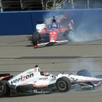 
              Takuma Sato (14) slides along the wall after colliding with Will Power (1) during the closing laps Saturday June 27, 2015 during the IndyCar auto race at Auto Club Speedway in Fontana, Calif. (AP Photo/Will Lester)
            