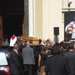 
              Pallbearers carry the casket of French Formula One driver Jules Bianchi into Sainte Reparate Cathedral during his funeral in Nice, French Riviera, Tuesday, July 21, 2015. Bianchi, 25, died Friday from head injuries sustained in a crash at last year's Japanese Grand Prix. He had been in a coma since the Oct. 5 accident, in which he collided at high speed with a mobile crane which was being used to pick up another crashed car. (AP Photo/Lionel Cironneau)
            