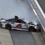
              Trevor Bayne wrecks into a wall during a NASCAR Sprint Cup series auto race, Sunday, May 31, 2015, at Dover International Speedway in Dover, Del. (AP Photo/Nick Wass)
            