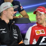 
              Force India driver Nico Huelkenberg of Germany and Ferrari driver Sebastian Vettel of Germany, right, smile during a press conference prior to the Formula One Grand Prix, at the Red Bull Ring in Spielberg, southern Austria, Thursday, June 18, 2015. (AP Photo/Kerstin Joensson)
            