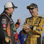
              Matt Kenseth, right, talks with Tony Stewart before qualifying for Sunday's NASCAR Sprint Cup series auto race at Charlotte Motor Speedway in Concord, N.C., Thursday, May 21, 2015. (AP Photo/Chuck Burton)
            