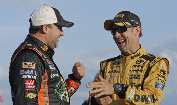 Matt Kenseth, right, talks with Tony Stewart before qualifying for Sunday’s NASCAR Sprint Cup...