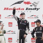 
              Josef Newgarden, center, of the United States, celebrates his victory with second place finisher Luca Filippi, left, of Italy, and third place finisher Helio Castroneves, of Brazil, following the Honda Toronto IndyCar race in Toronto on Sunday, June 14, 2015.  (Darren Calabrese/The Canadian Press via AP) MANDATORY CREDIT
            
