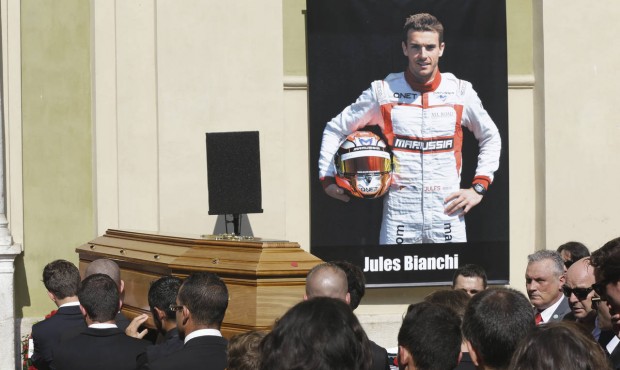 Pallbearers carry the casket of French Formula One driver Jules Bianchi into Sainte Reparate Cathed...