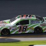 
              Kyle Busch drives his backup car during a NASCAR Sprint Cup practice session at Daytona International Speedway, Friday, July 3, 2015, in Daytona Beach, Fla. Busch was involved in a crash earlier and had to go to his backup car for the second practice session. (AP Photo/Terry Renna)
            