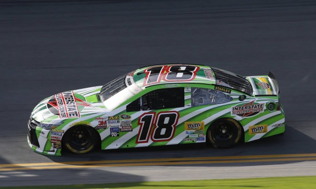 Kyle Busch drives his backup car during a NASCAR Sprint Cup practice session at Daytona Internation...