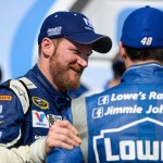 
              Dale Earnhardt Jr., left, talks to Jimmie Johnson, right, in Victory Lane after winning the Talladega 500 NASCAR Sprint Cup Series auto race at Talladega Superspeedway, Sunday, May 3, 2015, in Talladega, Ala. (AP Photo/David Tulis)
            