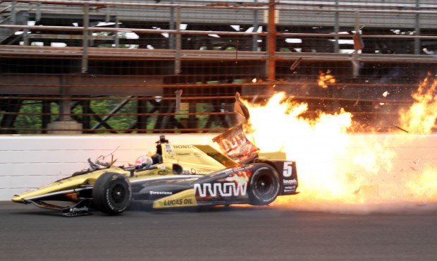James Hinchcliffe, of Canada, hits the wall in the third turn during practice for the Indianapolis ...
