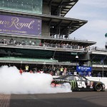 
              Kyle Busch does a burnout on the front straight after winning the NASCAR Xfinity Series auto race at Indianapolis Motor Speedway in Indianapolis, Saturday, July 25, 2015. (AP Photo/Rob Baker)
            