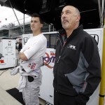 
              FILE - In this May 16, 2010, file photo, Graham Rahal, left, and his father and car owner, Bobby Rahal, check the video screens during the second day of practice for the Indianapolis 500 auto race at Indianapolis Motor Speedway in Indianapolis. Rahal loves going to the track these days to watch his son drive, and let team members do their jobs during races without any meddling from one of the team owners. (AP Photo/Darron Cummings, File)
            