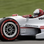 
              Helio Castroneves, of Brazil, steers his car during qualifying for the Grand Prix of Indianapolis auto race at Indianapolis Motor Speedway in Indianapolis, Friday, May 8, 2015.  (AP Photo/Darron Cummings)
            