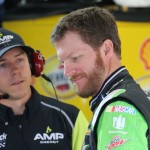 
              Dale Earnhardt Jr., right, talks with crew chief Greg Ives after practicing for Sunday's NASCAR Sprint Cup series auto race at Michigan International Speedway, Friday, June 12, 2015, in Brooklyn, Mich. (AP Photo/Bob Brodbeck)
            