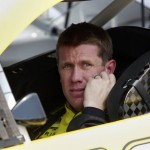 
              Sprint Cup Series driver Carl Edwards (19) sits in his car during qualifying for the NASCAR Brickyard 400 auto race at Indianapolis Motor Speedway in Indianapolis, Saturday, July 25, 2015. (AP Photo/R Brent Smith)
            