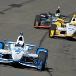 
              Juan Pablo Montoya (2), from Colombia, leads teammate Simon Pagenaud (22), from France, towards turn one during the opening practice session, Friday morning, June 26, 2015, for the IndyCar auto race at Auto Club Speedway in Fontana, Calif.  (AP Photo/Will Lester)
            