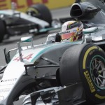 
              Mercedes driver Lewis Hamilton, of Great Britain, steers his car at the hairpin followed by team mate Nico Rosberg, of Germany, during the Canadian Grand Prix auto race in Montreal on Sunday, June 7, 2015. Hamilton won the race while Rosberg placed second. (Jacques Boissinot/The Canadian Press via AP) MANDATORY CREDIT
            