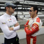
              Helio Castroneves, of Brazil, right, talks with Townsend Bell before the start of practice for the Indianapolis 500 auto race at Indianapolis Motor Speedway in Indianapolis, Monday, May 18, 2015.  (AP Photo/Darron Cummings)
            