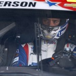 
              Jimmie Johnson waits in his car before practice for Sunday's NASCAR Coca-Cola 600 Sprint Cup series auto race at Charlotte Motor Speedway in Concord, N.C., Thursday, May 21, 2015. (AP Photo/Terry Renna)
            