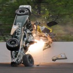 
              Ed Carpenter hits the wall in the second turn during practice before qualifications for the Indianapolis 500 auto race at Indianapolis Motor Speedway in Indianapolis, Sunday, May 17, 2015.  Carpenter walked away from the crash and has been released from he track hospital after being checked. (AP Photo/Greg Huey)
            