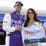 
              Denny Hamlin, left, poses with the pole award after he won the pole during qualifying for Sunday's NASCAR Sprint Cup series auto race, Friday, May 29, 2015, at Dover International Speedway in Dover, Del. (AP Photo/Nick Wass)
            