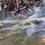 
              Austin Dillon (3) goes airborne as he was involved in a multi-car crash on the final lap of the NASCAR Sprint Cup series auto race at Daytona International Speedway, Monday, July 6, 2015, in Daytona Beach, Fla.  (Stephen M. DoweLl/The Orlando Sentinel via AP) MAGS OUT NO SALES
            
