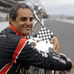
              Juan Pablo Montoya, of Colombia, hugs the Borg-Warner Trophy during the traditional winners photo session at Indianapolis Motor Speedway in Indianapolis, Monday, May 25, 2015. Montoya won the 99th running of the Indianapolis 500 auto race on Sunday.  (AP Photo/Michael Conroy)
            